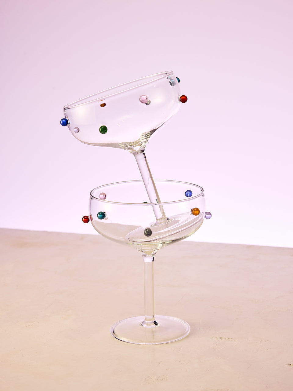 A pair of multicolor Dot Coupes stacked on top of each other.