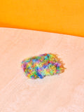 A single rainbow sponge.