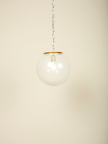 Vintage Lattimo Glass Pendant Lamp with iconic white swirl globe and brass hardware.